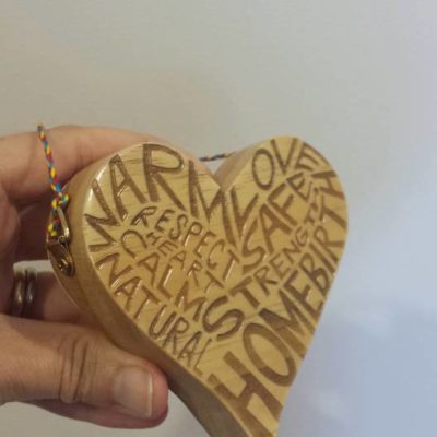 Wooden HOMEBIRTH heart in hand